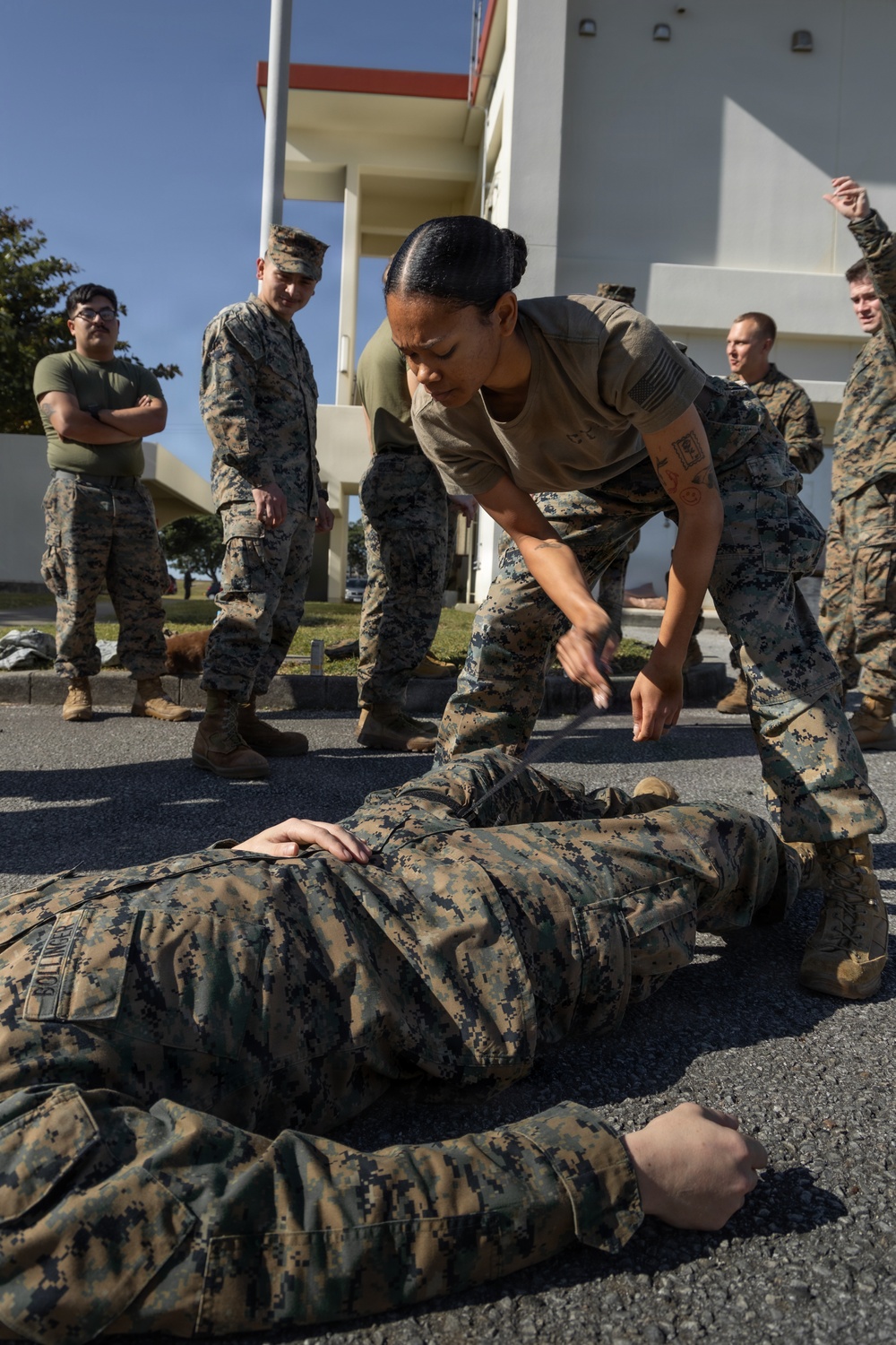5th Air Naval Gunfire Liaison Company Marines conduct tactical combat casualty care training