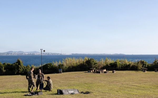 III Marine Expeditionary Force meteorology and oceanography analyst forecasters set up weather sensor