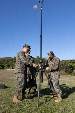 III Marine Expeditionary Force meteorology and oceanography analyst forecasters set up weather sensor