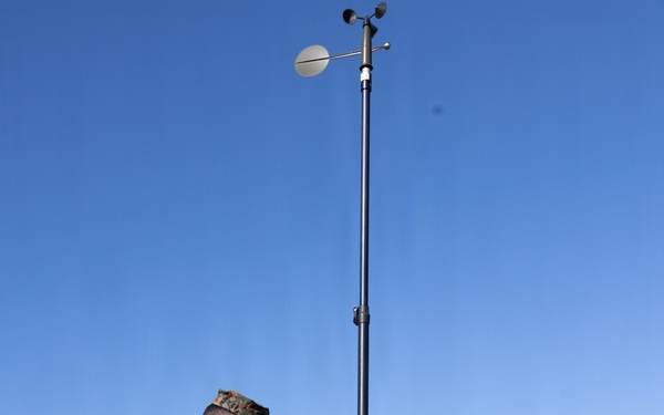 III Marine Expeditionary Force meteorology and oceanography analyst forecasters set up weather sensor