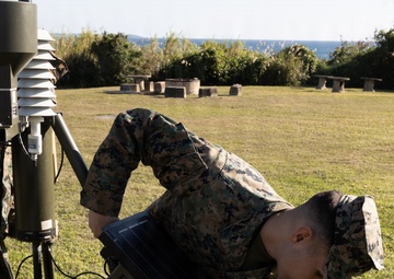 III Marine Expeditionary Force meteorology and oceanography analyst forecasters set up weather sensor