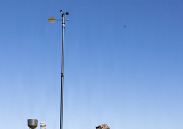 III Marine Expeditionary Force meteorology and oceanography analyst forecasters set up weather sensor