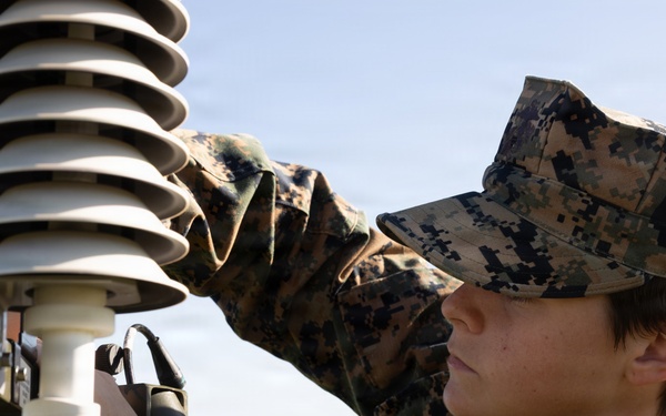 III Marine Expeditionary Force meteorology and oceanography analyst forecasters set up weather sensor