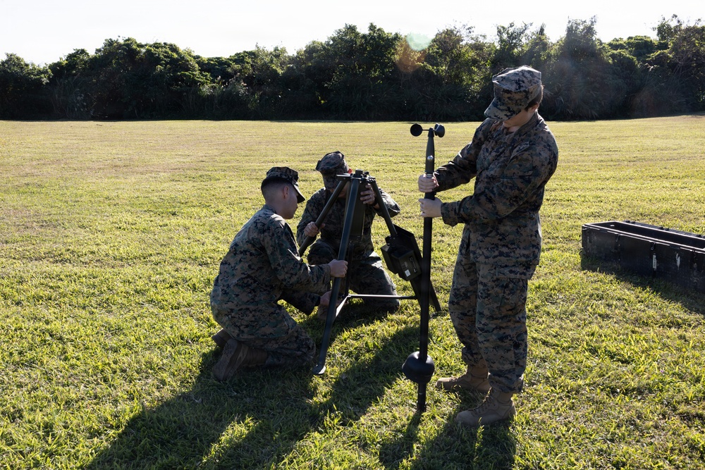 III Marine Expeditionary Force meteorology and oceanography analyst forecasters set up weather sensor