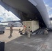 Airmen from the 113th Contingency Response Squadron transport cargo for Exercise Sentry Aloha