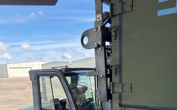 Airmen from the 113th Contingency Response Squadron transport cargo for Exercise Sentry Aloha