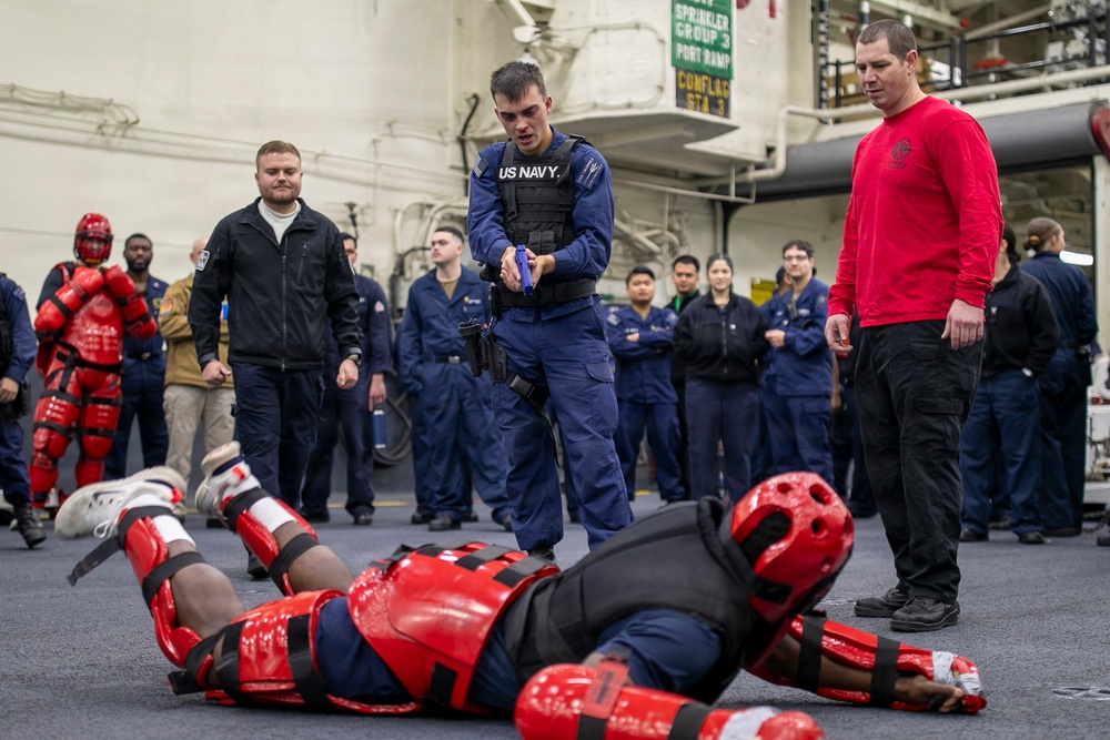 USS Tripoli Sailors Go Through the Non-Lethal Weapons Course