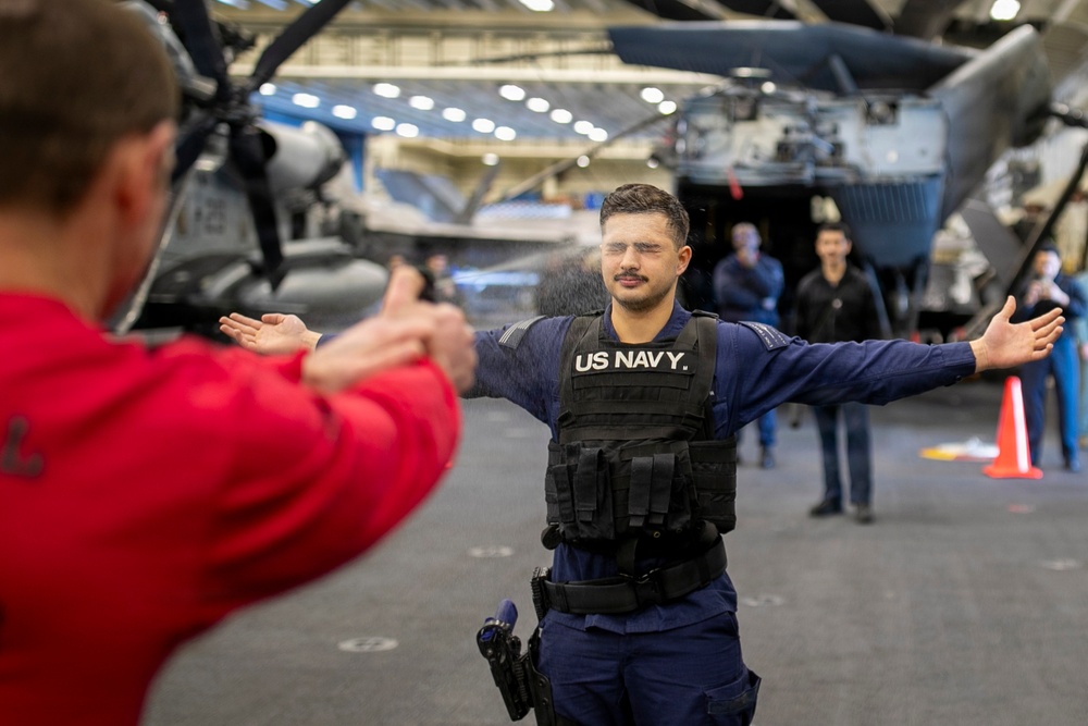 USS Tripoli Sailors Go Through the Non-Lethal Weapons Course