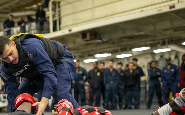 USS Tripoli Sailors Go Through the Non-Lethal Weapons Course
