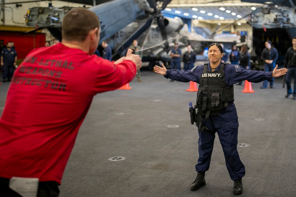 USS Tripoli Sailors Go Through the Non-Lethal Weapons Course