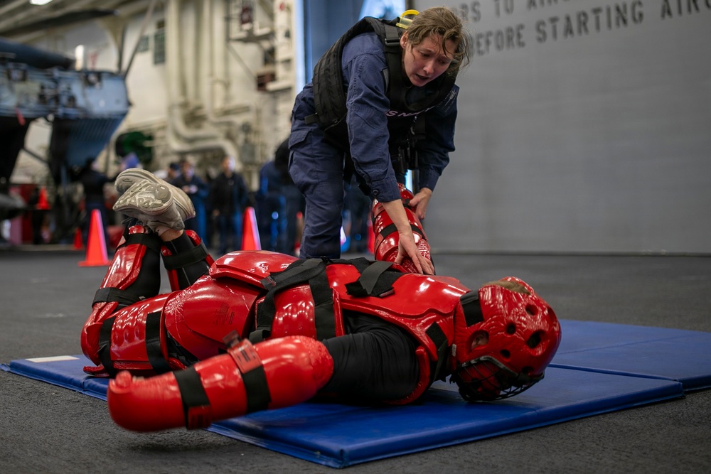 USS Tripoli Sailors Go Through the Non-Lethal Weapons Course