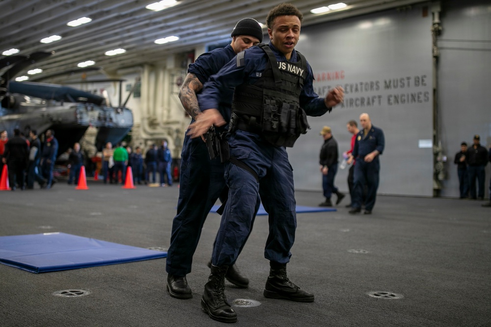USS Tripoli Sailors Go Through the Non-Lethal Weapons Course