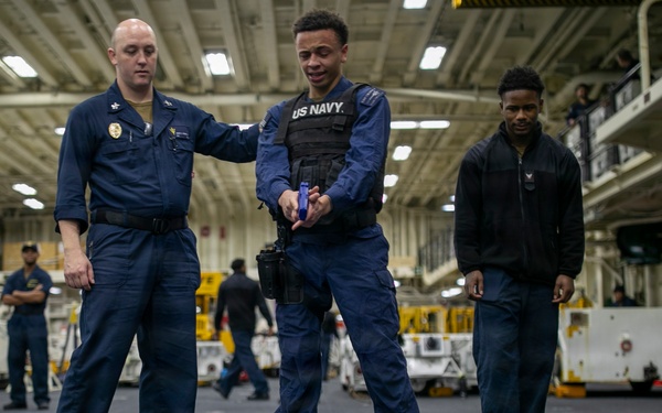 USS Tripoli Sailors Go Through the Non-Lethal Weapons Course