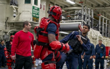 USS Tripoli Sailors Go Through the Non-Lethal Weapons Course