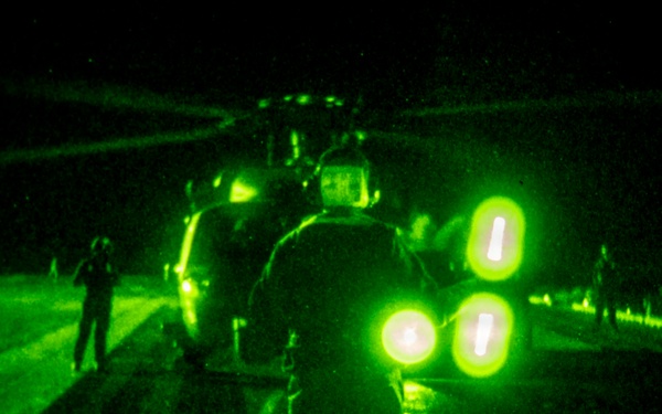 USS Theodore Roosevelt Conducts Nighttime Helicopter Operations