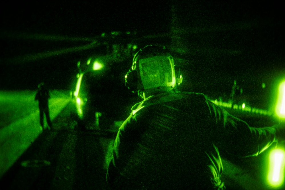 USS Theodore Roosevelt Conducts Nighttime Helicopter Operations