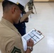 Marines volunteer for the 3rd annual JROTC drill competition