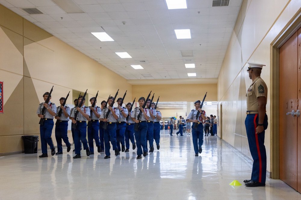Marines volunteer for the 3rd annual JROTC drill competition