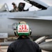 Sailor prepares an F/A-18E for takeoff at NAS Oceana