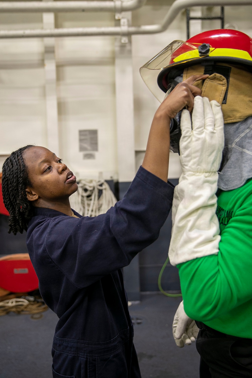 USS Tripoli Conducts a Main Space Fire Drill