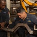 Maintenance conducted in USS Blue Ridge's engine room