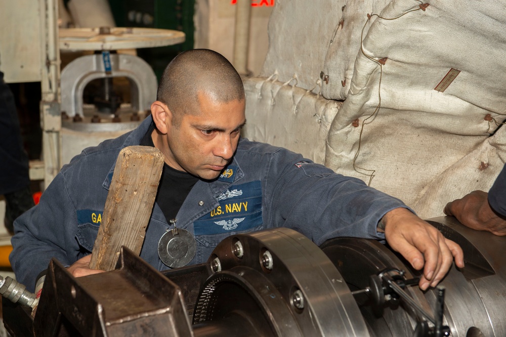 Maintenance conducted in USS Blue Ridge's engine room