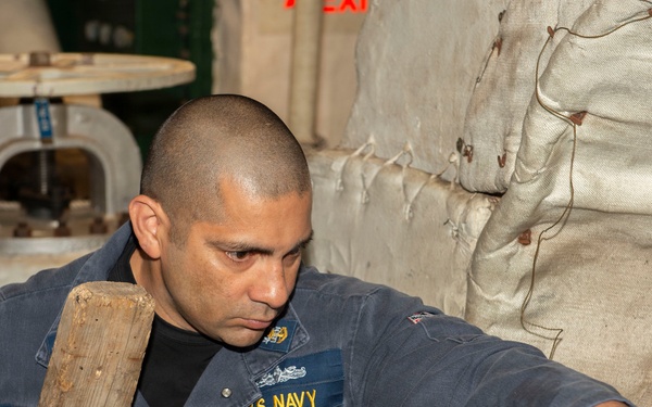 Maintenance conducted in USS Blue Ridge's engine room