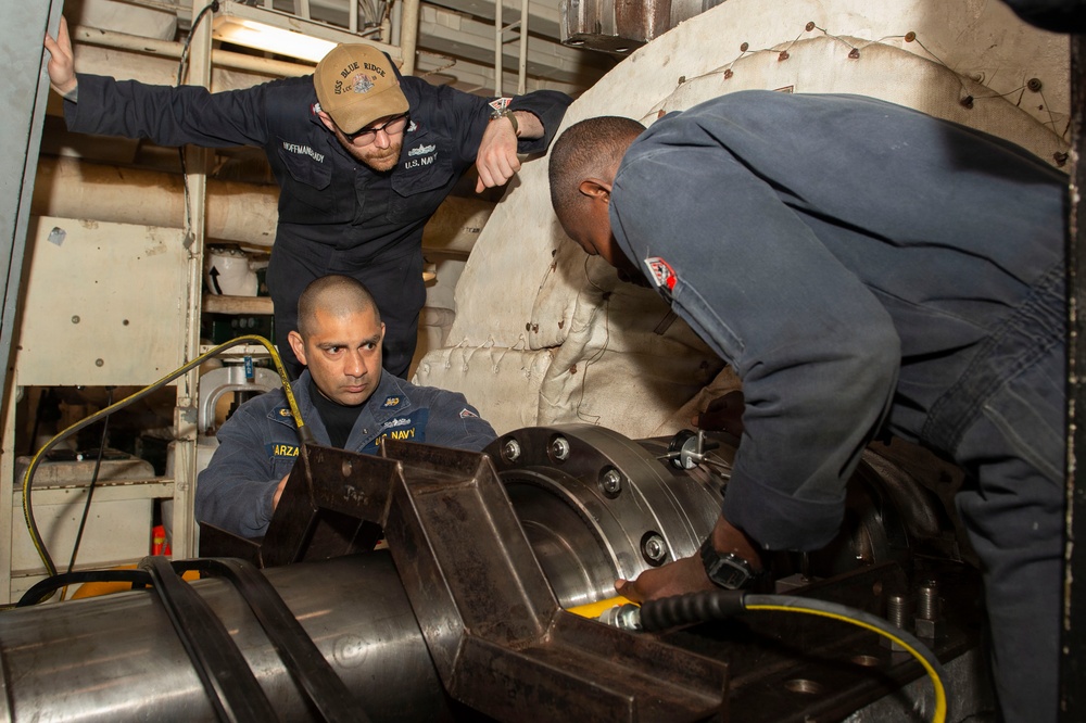 Maintenance conducted in USS Blue Ridge's engine room