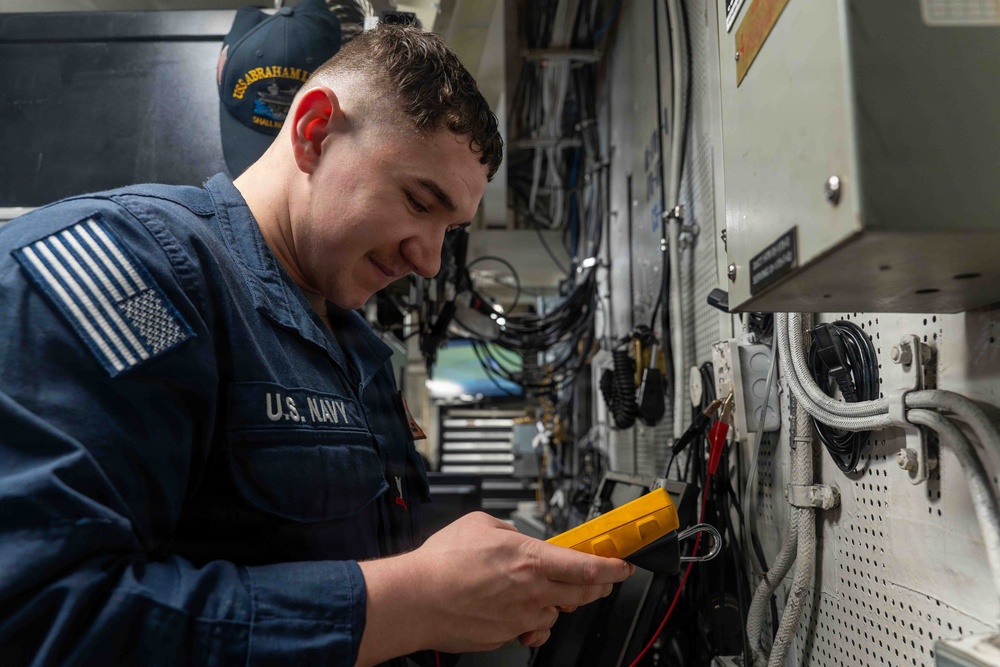 Abraham Lincoln conducts routine electrical testing