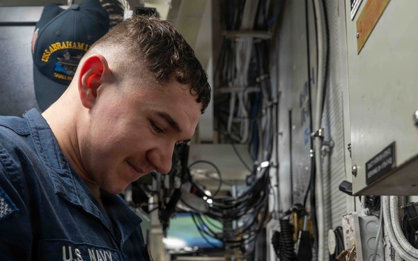 Abraham Lincoln conducts routine electrical testing