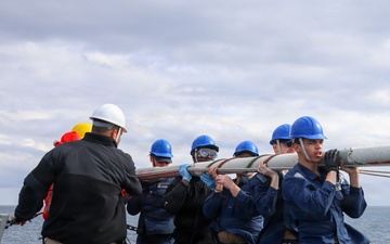 Sailors aboard the USS John Finn conduct a sea and anchor detail in Okinawa, Japan