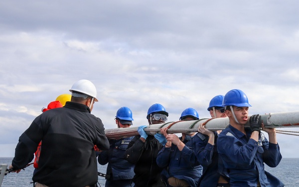 Sailors aboard the USS John Finn conduct a sea and anchor detail in Okinawa, Japan