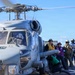 Sailors aboard the USS John Finn conduct flight quarters in the East China Sea
