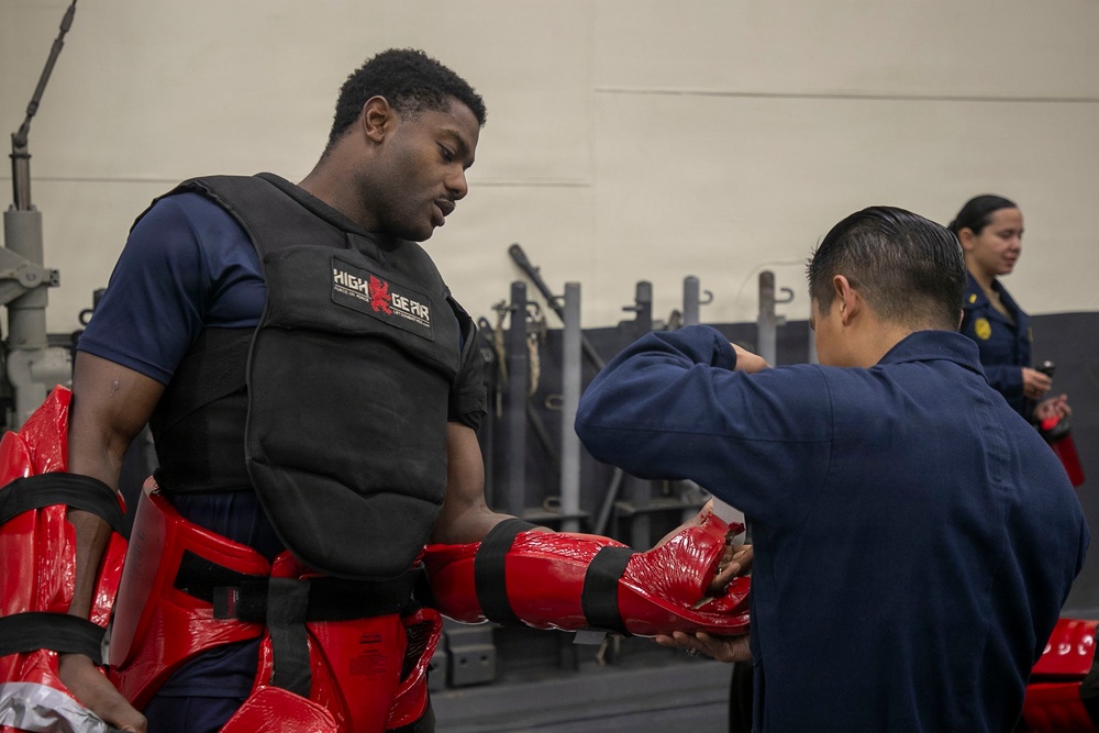 USS Tripoli Sailors Go Through the Non-Lethal Weapons Course