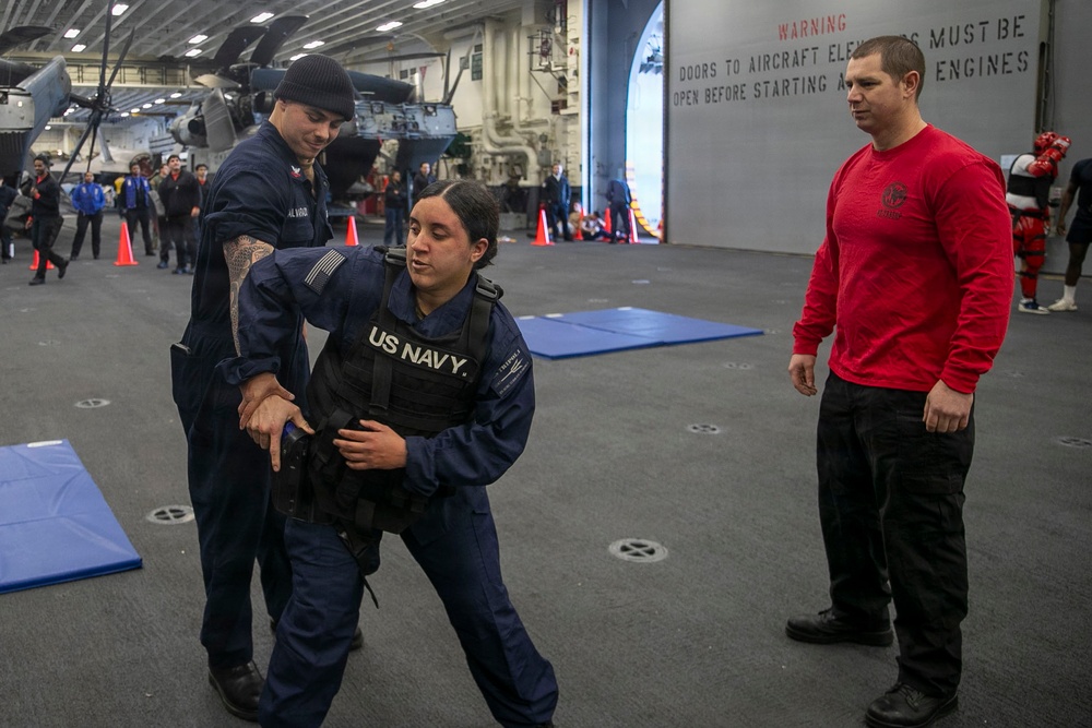 USS Tripoli Sailors Go Through the Non-Lethal Weapons Course