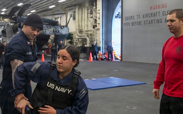 USS Tripoli Sailors Go Through the Non-Lethal Weapons Course