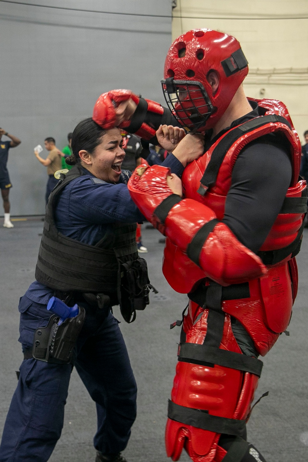 USS Tripoli Sailors Go Through the Non-Lethal Weapons Course