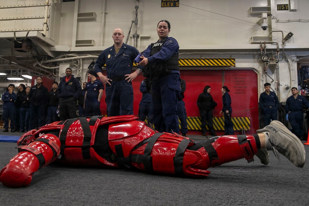 USS Tripoli Sailors Go Through the Non-Lethal Weapons Course