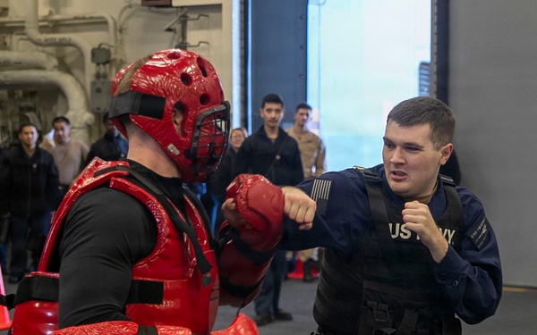 USS Tripoli Sailors Go Through the Non-Lethal Weapons Course