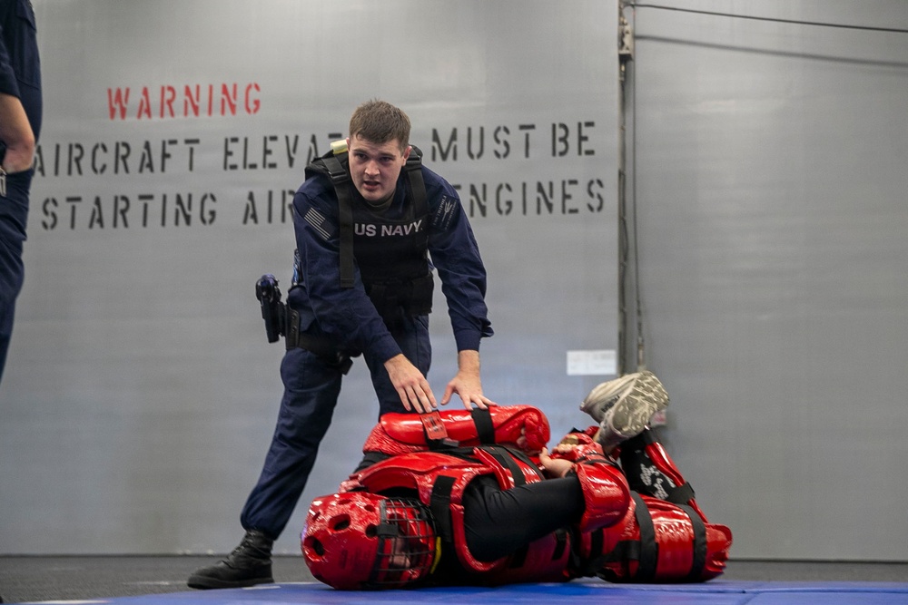 USS Tripoli Sailors Go Through the Non-Lethal Weapons Course