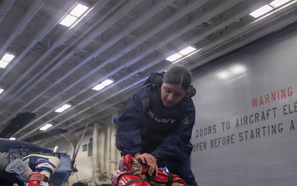 USS Tripoli Sailors Go Through the Non-Lethal Weapons Course