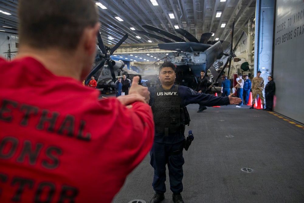 USS Tripoli Sailors Go Through the Non-Lethal Weapons Course