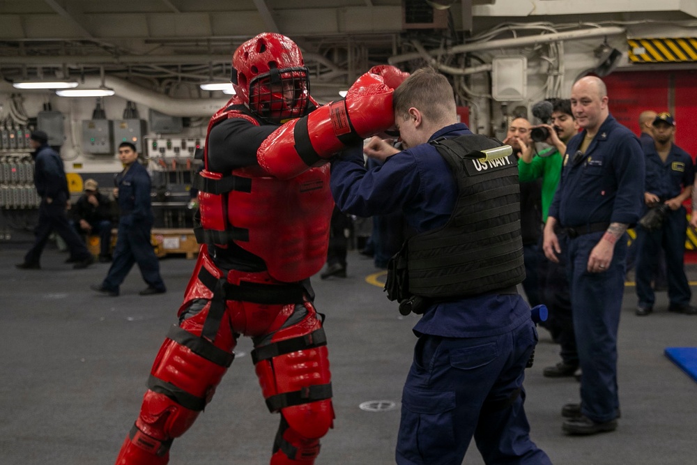 USS Tripoli Sailors Go Through the Non-Lethal Weapons Course