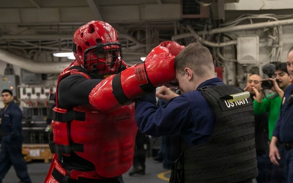 USS Tripoli Sailors Go Through the Non-Lethal Weapons Course
