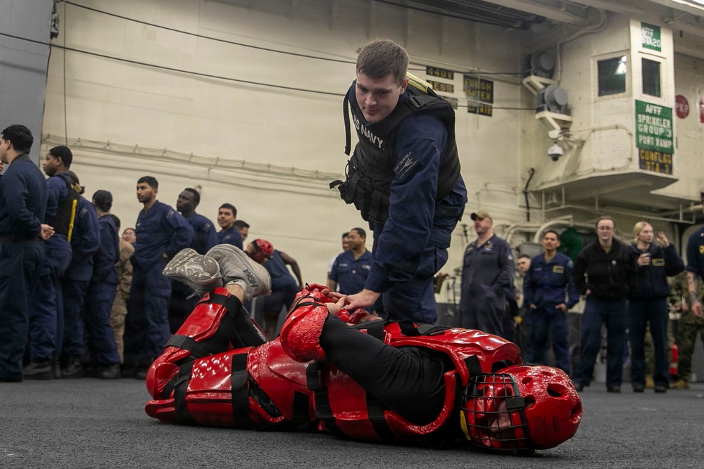 USS Tripoli Sailors Go Through the Non-Lethal Weapons Course