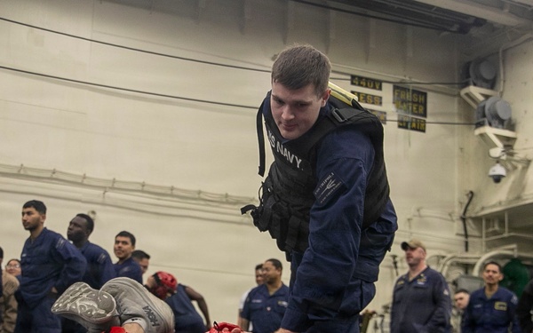 USS Tripoli Sailors Go Through the Non-Lethal Weapons Course