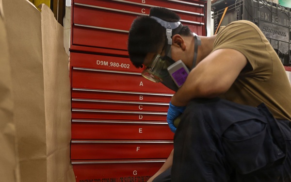 Abraham Lincoln conducts routine maintenance