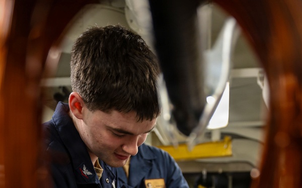 Abraham Lincoln disassembles motors