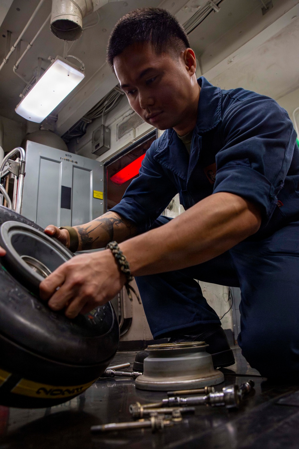 Abraham Lincoln conducts routine aircraft maintenance