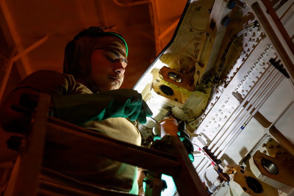 Abraham Lincoln conducts routine aircraft maintenance